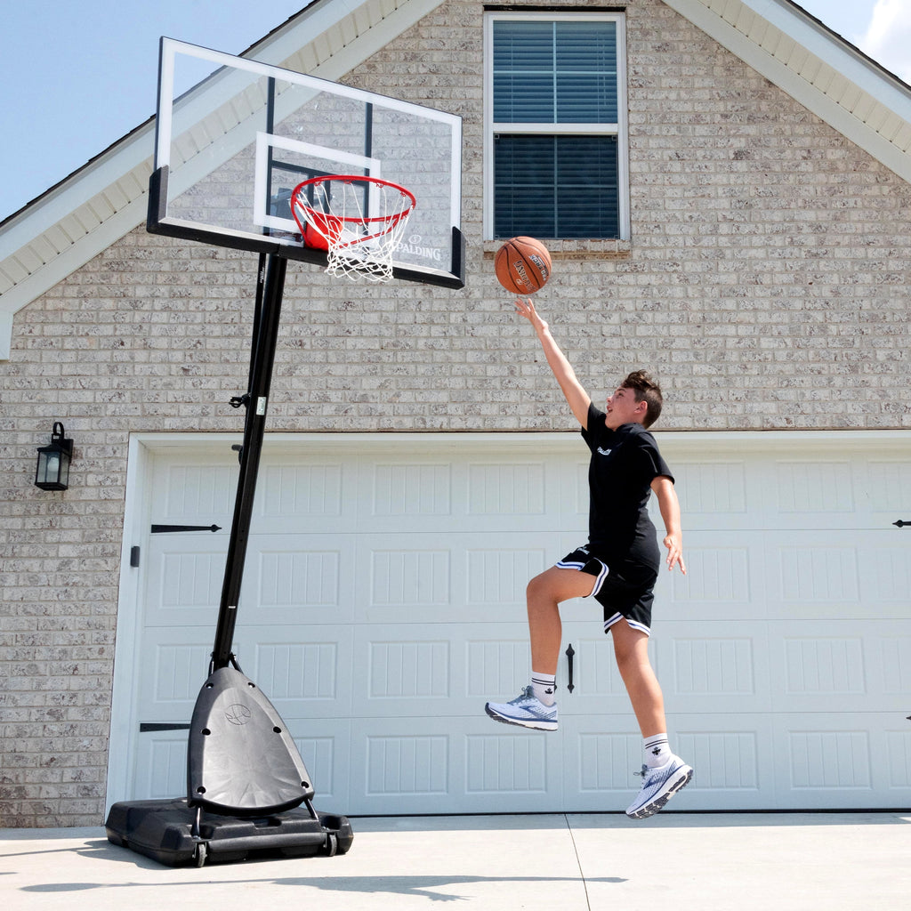 2026 Spalding 54-Inch Portable Basketball Hoop with Shatter-Proof Polycarbonate Backboard, Adjustable ExactaHeight System & Pro Slam Rim-Outdoor Play