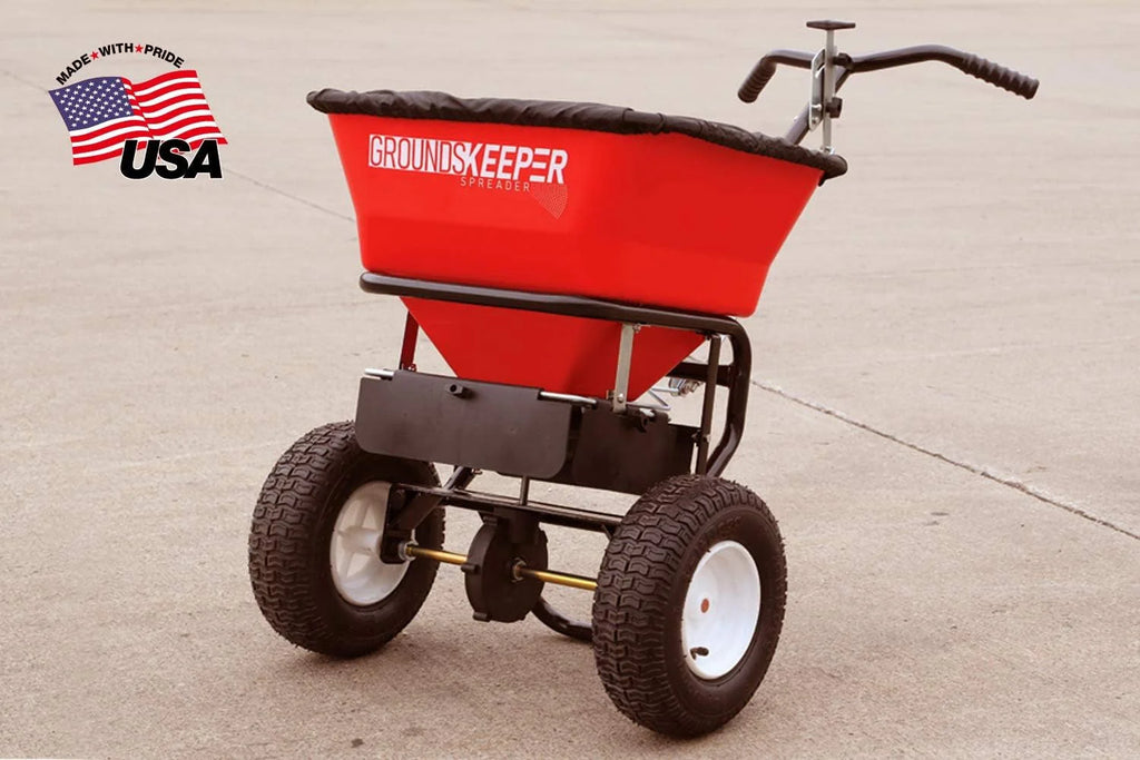 2026 Multi-purpose push-along spreader, 100 lb capacity, versatile tool for lawn seed, salt, de-icer, fertilizer and seeds