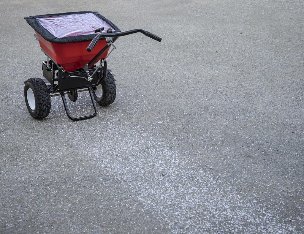 2026 Multi-purpose push-along spreader, 100 lb capacity, versatile tool for lawn seed, salt, de-icer, fertilizer and seeds